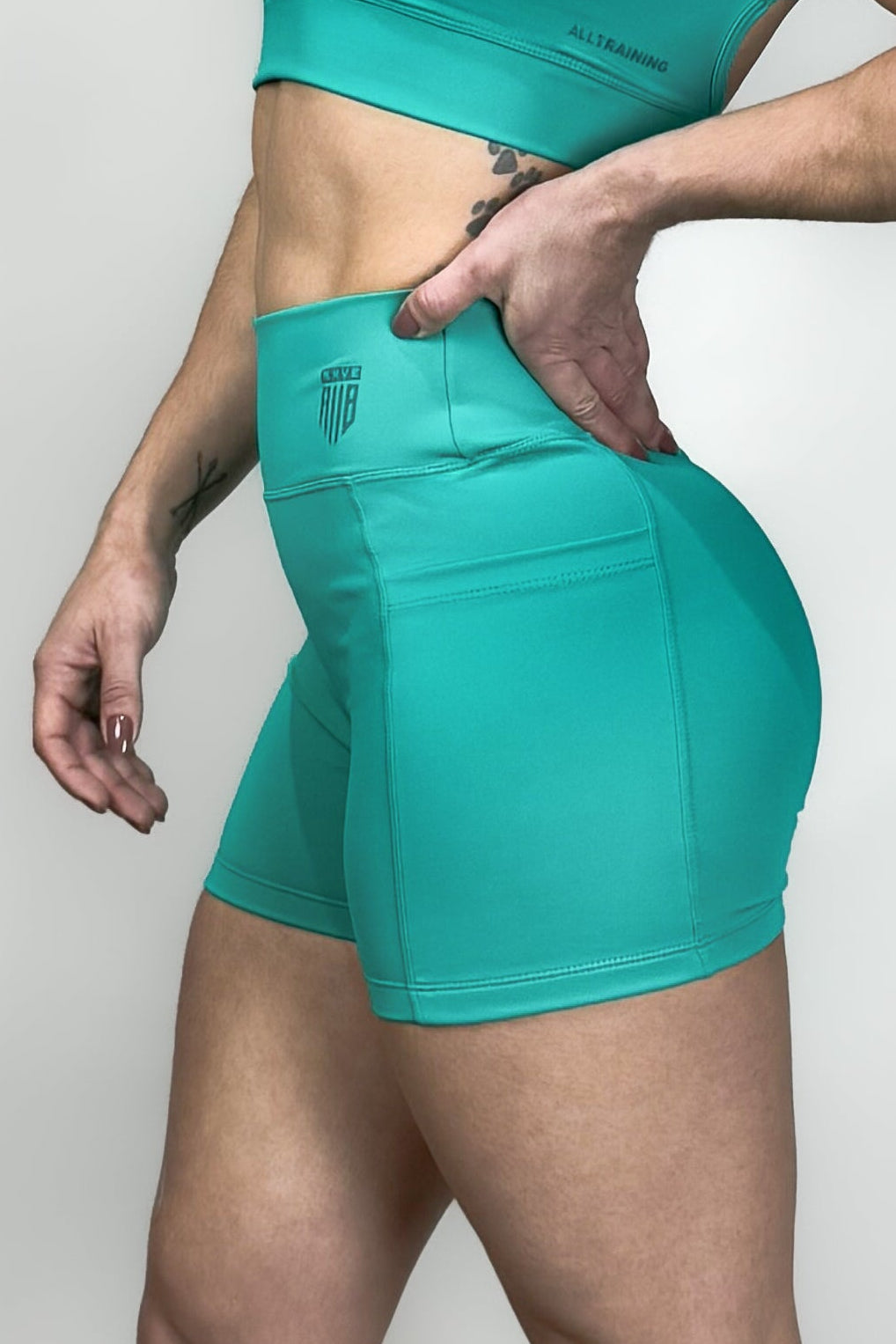 Shorts Feminino Alltraining® Essential com Bolso Verde Enseada